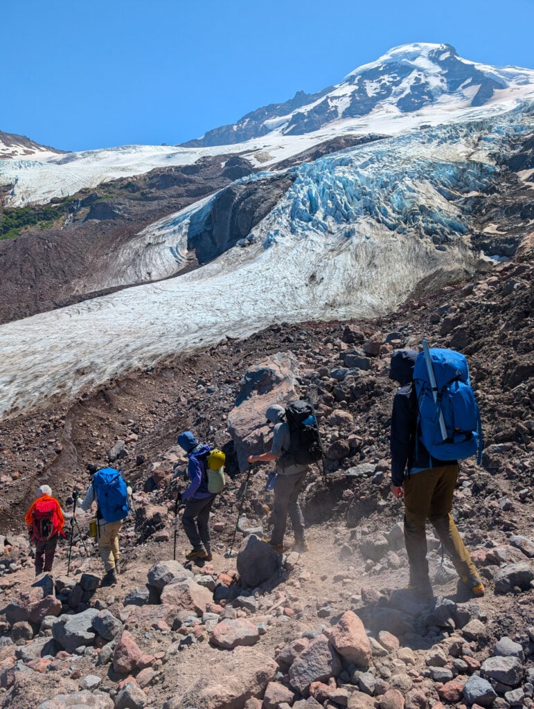 Students approach the seracs of the Coleman Glacier on Mt. Baker on an American Alpine Institute Leaders of Tomorrow Summit Camp