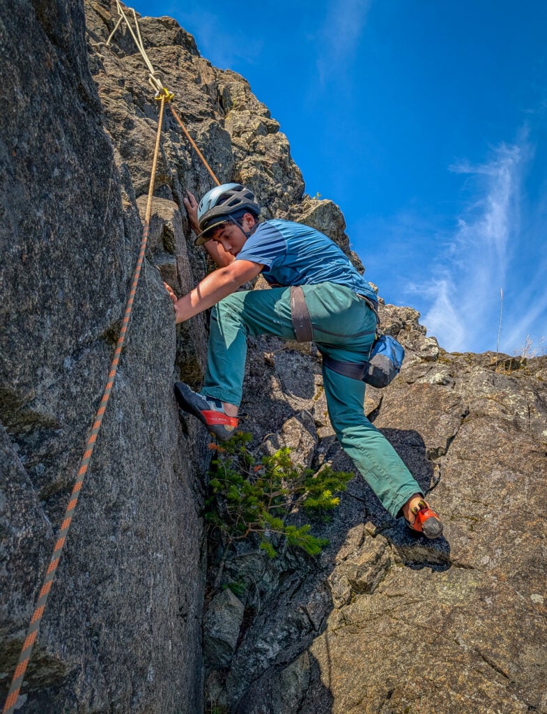 A young climber on the American Alpine Institute Leaders of Tomorrow program climbs at Mt. Erie