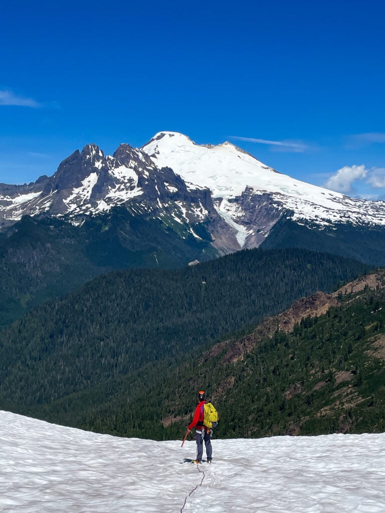 A climber looks at the sweeping views