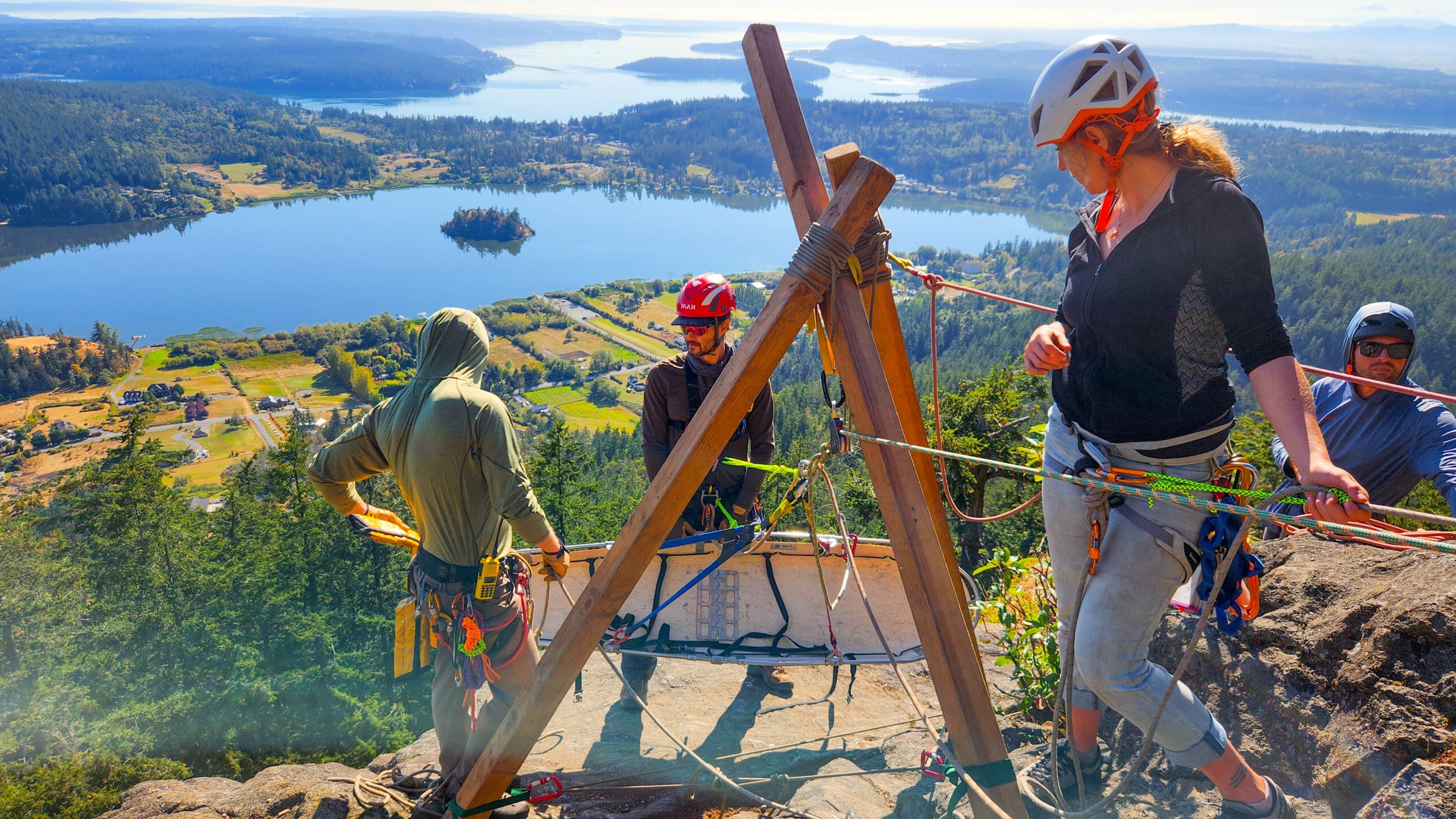 Students set up an advanced hauling system with a tripod on an American Alpine Institute rope rescue program