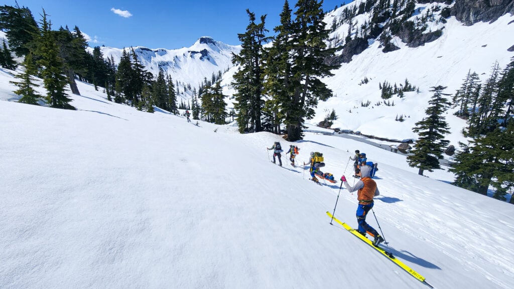 A group of skiers A group of skiers tour in the backcountry away from the crowds in the Mt. Baker Backcountry during an American Alpine Institute Ski program