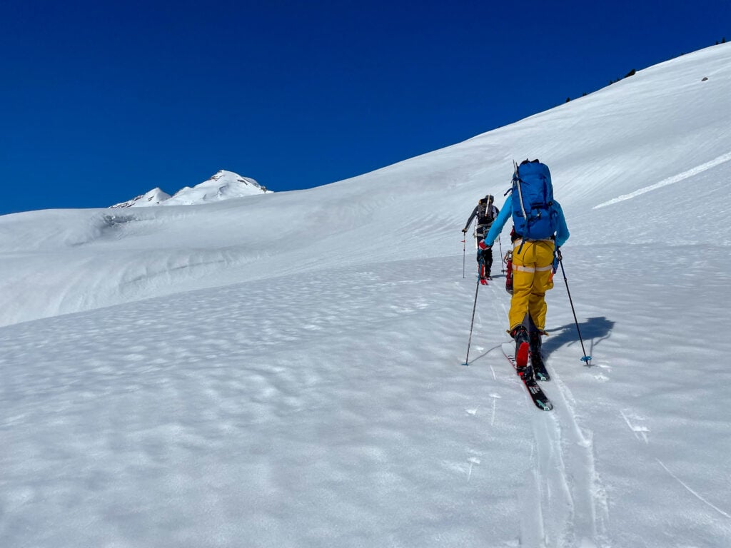 Skiers travel farther in into the Mt. Baker backcountry using ski mountaineering techniques in an American Alpine Institute ski program.