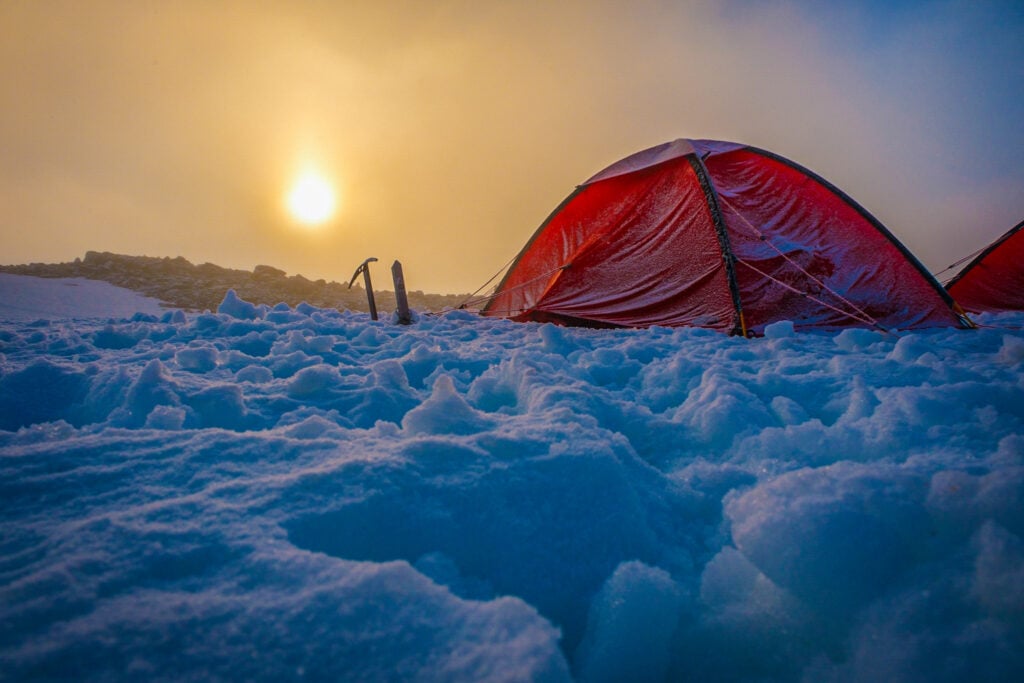 A frosty tent at sunset. Camp for the night on a winter camping course with the American Alpine Institute
